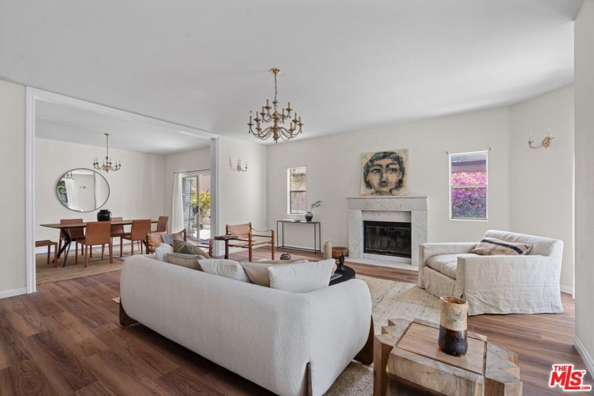 Wrapped in windows and light on all four sides, this expansive - Beach Condo for sale in Santa Monica, California on Beachhouse.com