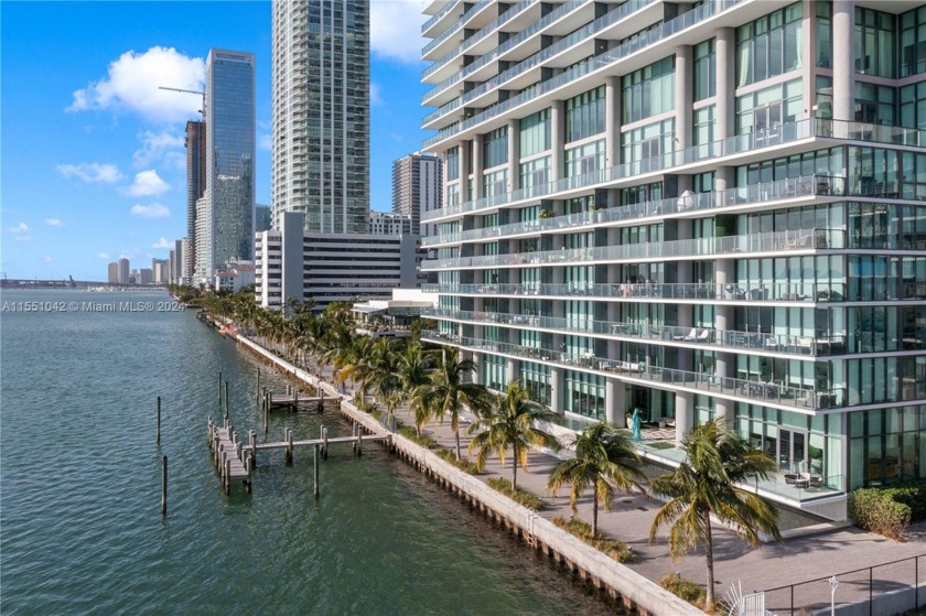 Step into the essence of refined water-front living with this - Beach Condo for sale in Miami, Florida on Beachhouse.com