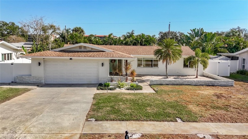 Located in the highly sought-after Yacht Club Estates, this - Beach Home for sale in Seminole, Florida on Beachhouse.com