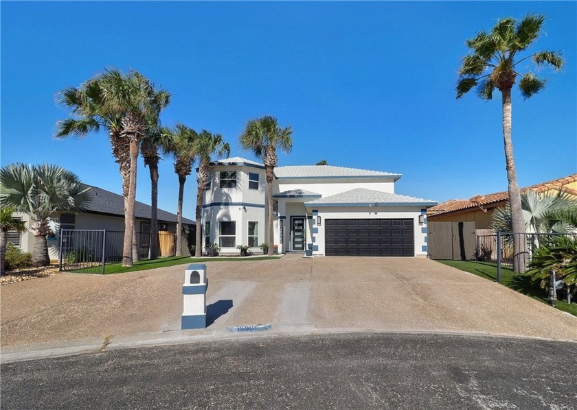 ALL THE BELLS AND WHISTLES!! This STUNNING waterfront home - Beach Home for sale in Corpus Christi, Texas on Beachhouse.com