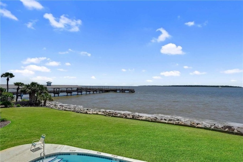 ENJOY WATERFRONT LIVING FROM THE LARGE BALCONY WITH VIEWS OF THE - Beach Condo for sale in Saint Simons, Georgia on Beachhouse.com