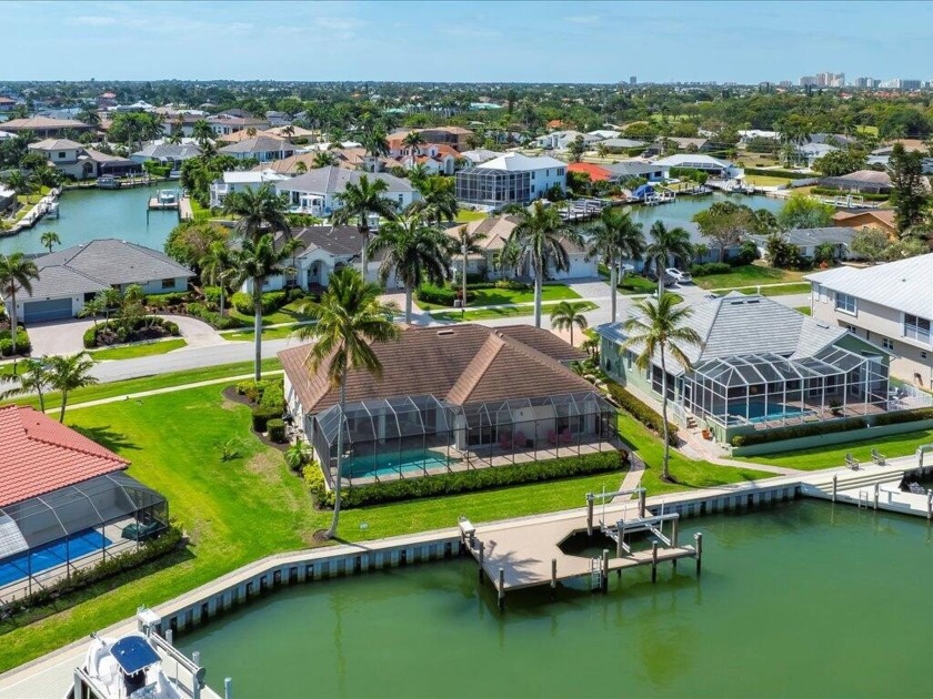 IMMERSE YOURSELF IN THE EPITOME OF LUXURY WATERFRONT LIVING ON - Beach Home for sale in Marco Island, Florida on Beachhouse.com