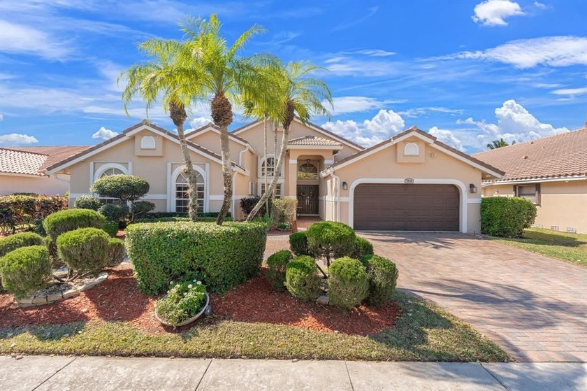 Exquisite 5-bedroom, 3-bath single-family residence in the heart - Beach Home for sale in Coral Springs, Florida on Beachhouse.com