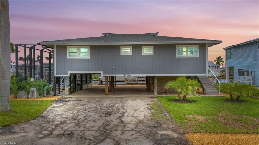 Welcome to the ultimate 2-bed, 2-bath canal-front oasis, where - Beach Home for sale in Fort Myers Beach, Florida on Beachhouse.com