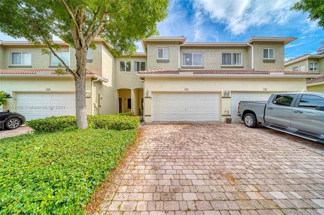 Discover this spacious and pristine lakefront gem in the coveted - Beach Townhome/Townhouse for sale in Homestead, Florida on Beachhouse.com