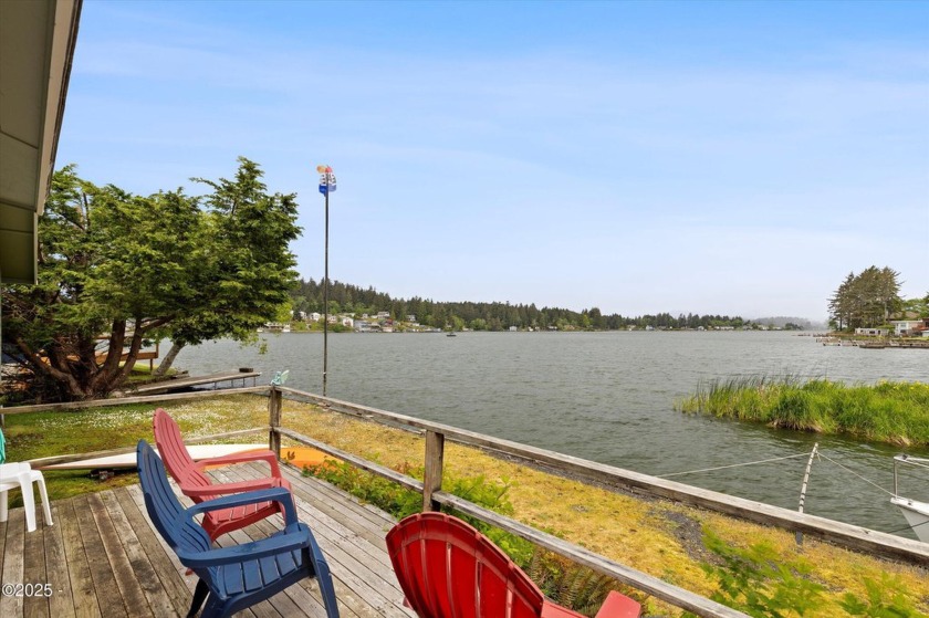 Opportunity awaits you with this lakefront home, which also - Beach Home for sale in Otis, Oregon on Beachhouse.com