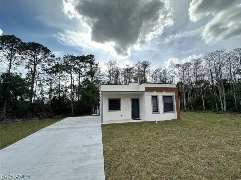 **BRAND NEW HOME** Welcome to your dream sanctuary. Modern - Beach Home for sale in Lehigh Acres, Florida on Beachhouse.com