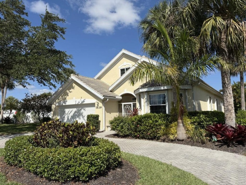 Nestled in a serene setting, this well-maintained home offers - Beach Home for sale in Naples, Florida on Beachhouse.com