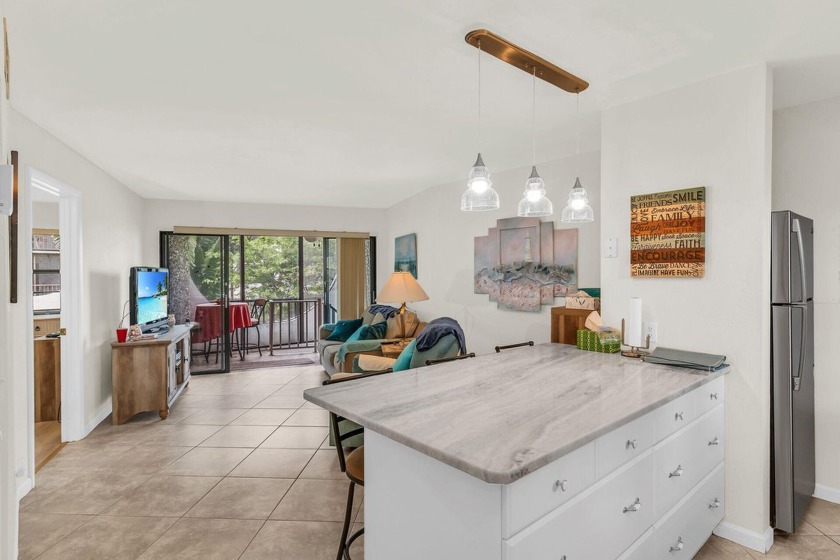 Great end unit with views of the pool and bay. Tile floor - Beach Condo for sale in Marco Island, Florida on Beachhouse.com