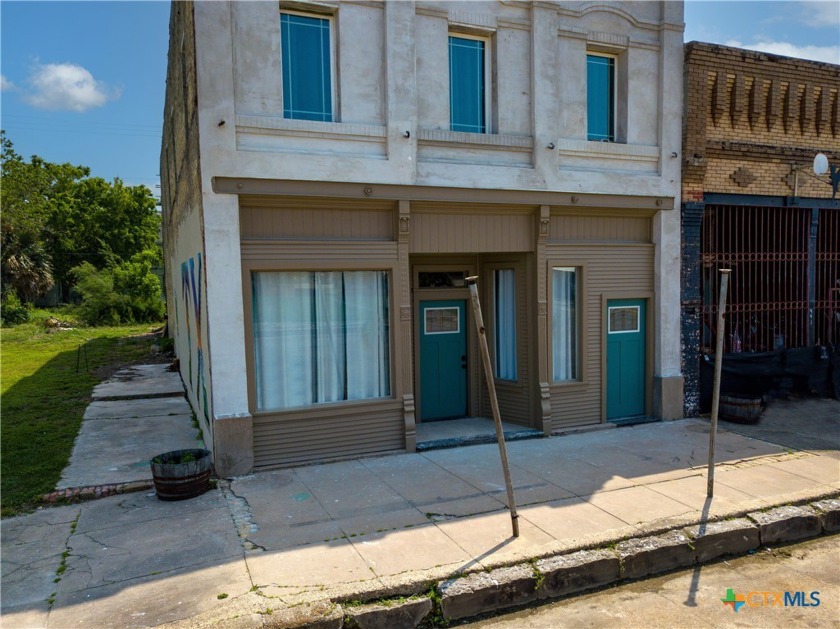 This remarkable two-story building in the historical district of - Beach Home for sale in Palacios, Texas on Beachhouse.com