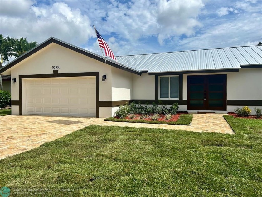 This stunning example of perfection is a 3 bedroom 2 bath - Beach Home for sale in Cooper City, Florida on Beachhouse.com