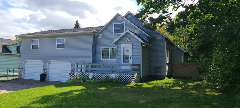 TERRIFIC 3-BEDR., 2-BATH HOME FEATURING A SPACIOUS LIVING ROOM - Beach Home for sale in Sault Sainte Marie, Michigan on Beachhouse.com