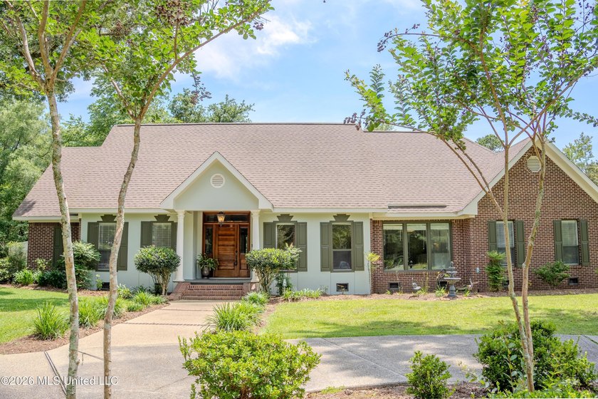 LUXURY ESTATE situated on 1.3+/- acres, offering PRIVACY - Beach Home for sale in D Iberville, Mississippi on Beachhouse.com