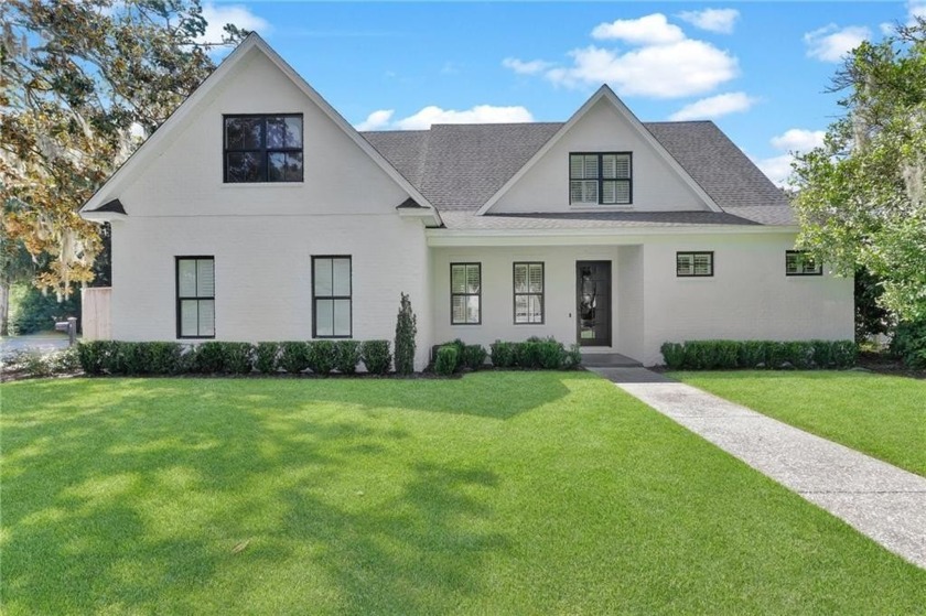 Located at the end of a quiet cul-de-sac in Lake View Cottages - Beach Home for sale in Saint Simons, Georgia on Beachhouse.com