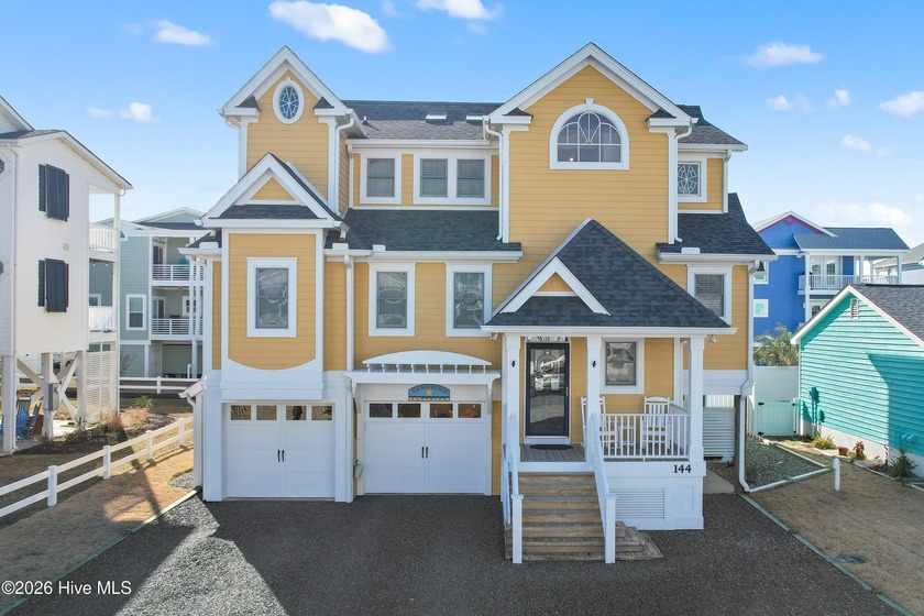 Coastal elegance at its finest! Welcome to 144 Carolina Avenue - Beach Home for sale in Holden Beach, North Carolina on Beachhouse.com