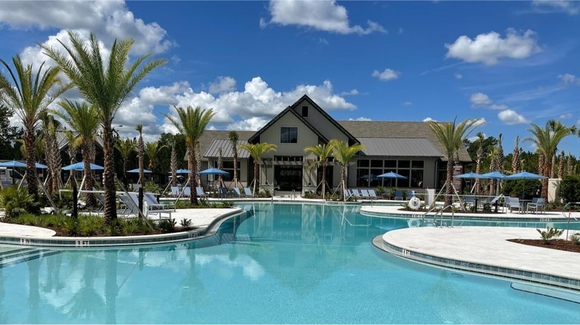 This luxe two-story home is designed to live like a single level - Beach Home for sale in Yulee, Florida on Beachhouse.com