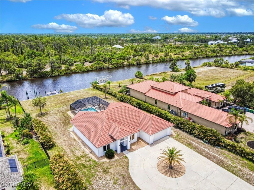 Stunning Contemporary Waterfront Estate with DIRECT Gulf Access - Beach Home for sale in Port Charlotte, Florida on Beachhouse.com