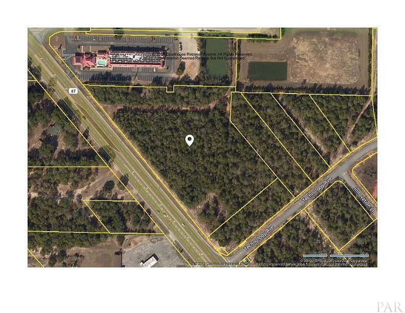 7 +- acres at one of the 2 major Interstate exits in Santa Rosa - Beach Acreage for sale in Milton, Florida on Beachhouse.com