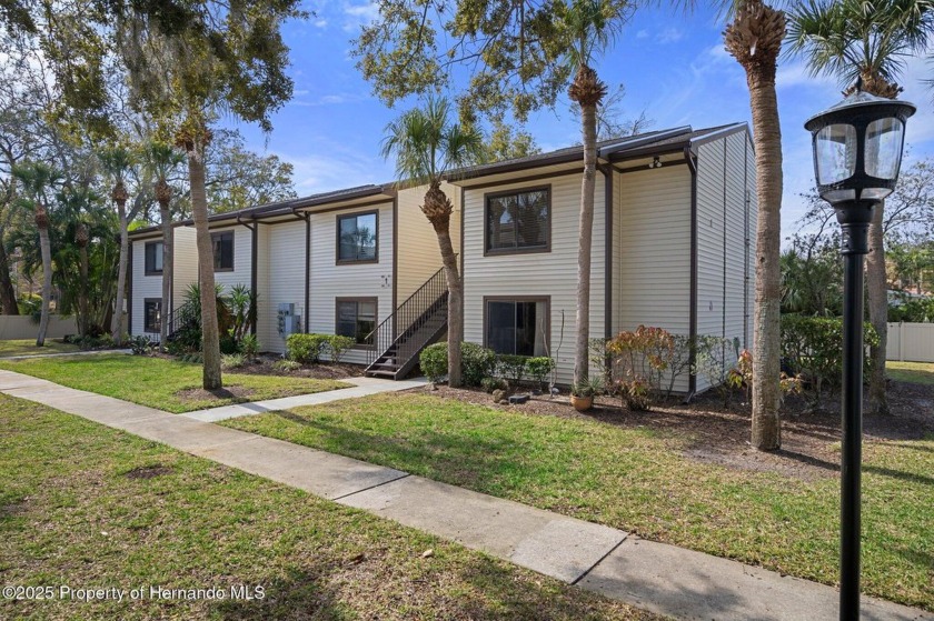 Embrace quintessential Florida waterfront living in this - Beach Condo for sale in Tarpon Springs, Florida on Beachhouse.com