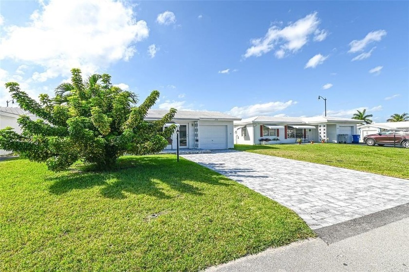 Welcome home to comfort, sunshine, and easy living in - Beach Home for sale in Pompano Beach, Florida on Beachhouse.com