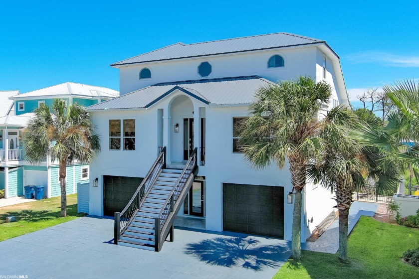 This immaculate custom home offers a stunning, open floorplan - Beach Home for sale in Orange Beach, Alabama on Beachhouse.com