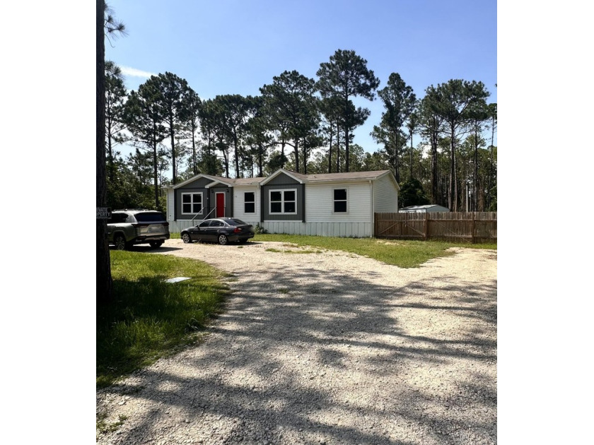 An opportunity to own a 2023 manufactured home with  1575 sq ft - Beach Home for sale in Santa Rosa Beach, Florida on Beachhouse.com