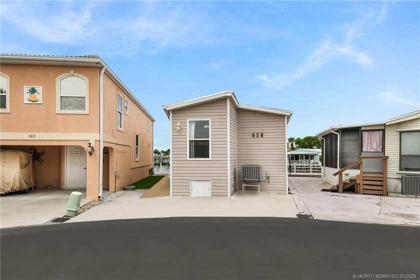 This charming 2-bed, 2-bath waterfront home is located in the - Beach Home for sale in Jensen Beach, Florida on Beachhouse.com