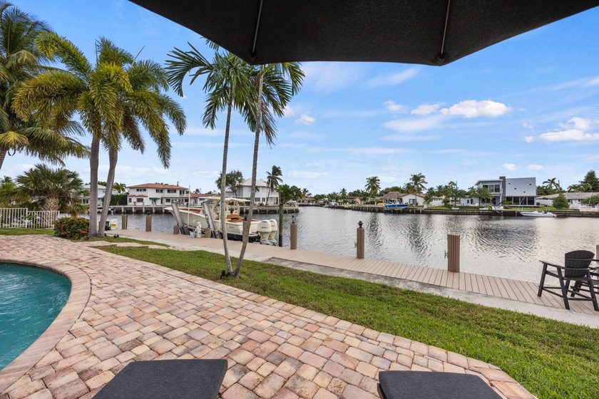 RARE OPPORTUNITY TO OWN A TURNKEY WATERFRONT HOME WITH 110 FT OF - Beach Home for sale in Pompano Beach, Florida on Beachhouse.com