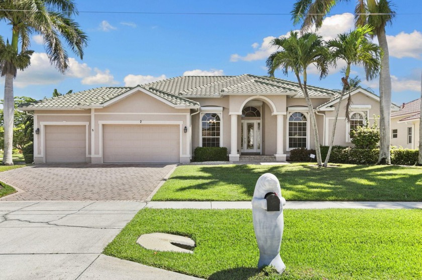 Tucked away on a rare .4-acre corner lot, this spacious - Beach Home for sale in Marco Island, Florida on Beachhouse.com