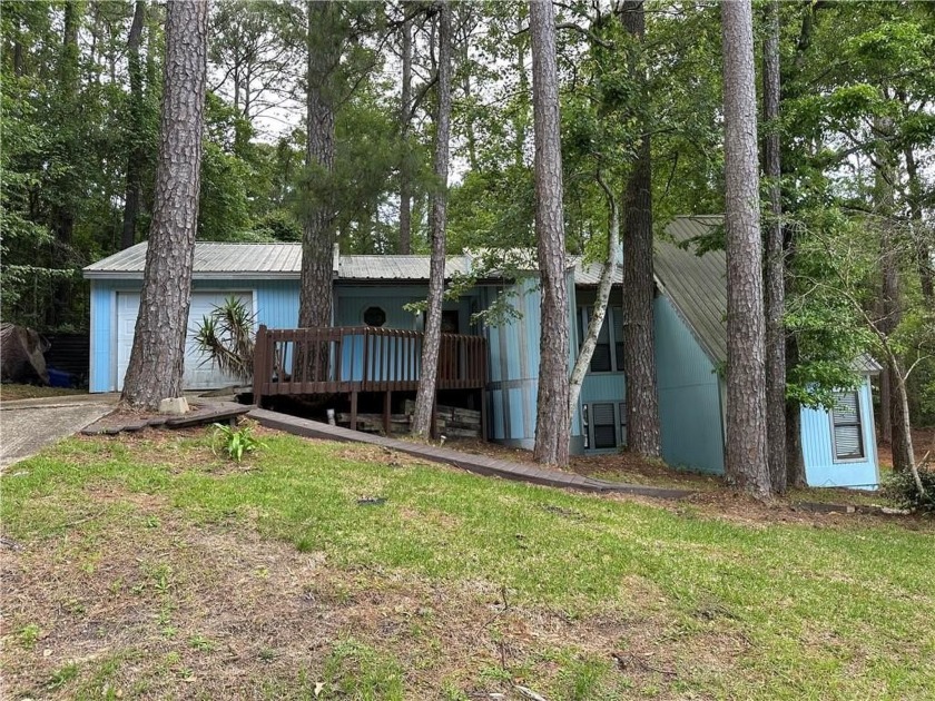 This is a Great Opportunity to get a fixer upper in the Lake - Beach Home for sale in Daphne, Alabama on Beachhouse.com