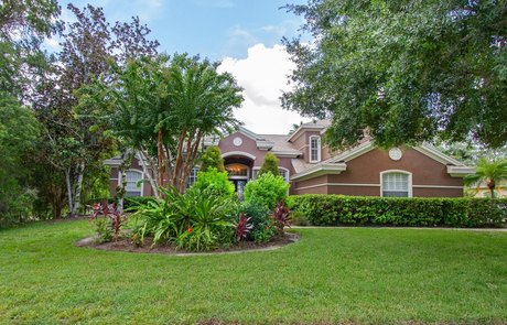 This executive 5 bedroom, 4 bathroom, 3 car garage, pool home - Beach Home for sale in Tarpon Springs, Florida on Beachhouse.com