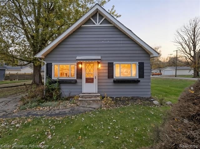 This two-bedroom ranch sits on a spacious double lot, offering - Beach Home for sale in Newport, Michigan on Beachhouse.com