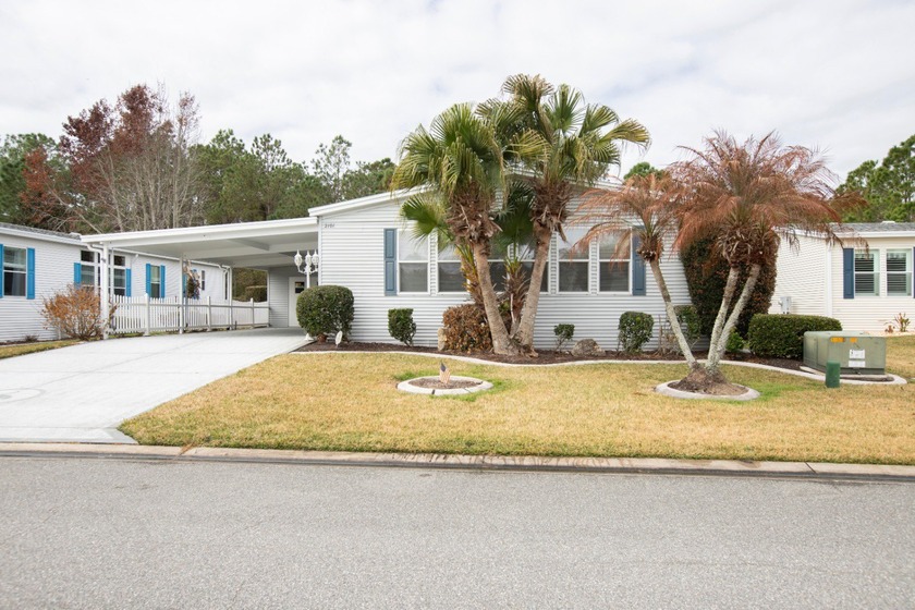 Located on leased land within the desirable Crane Lakes 55+ - Beach Lot for sale in Port Orange, Florida on Beachhouse.com