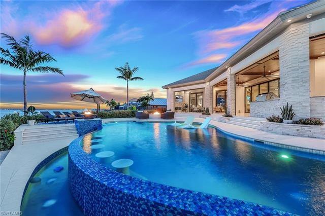 Step into waterfront luxury at this stunning  3/4  acre - Beach Home for sale in Cape Coral, Florida on Beachhouse.com