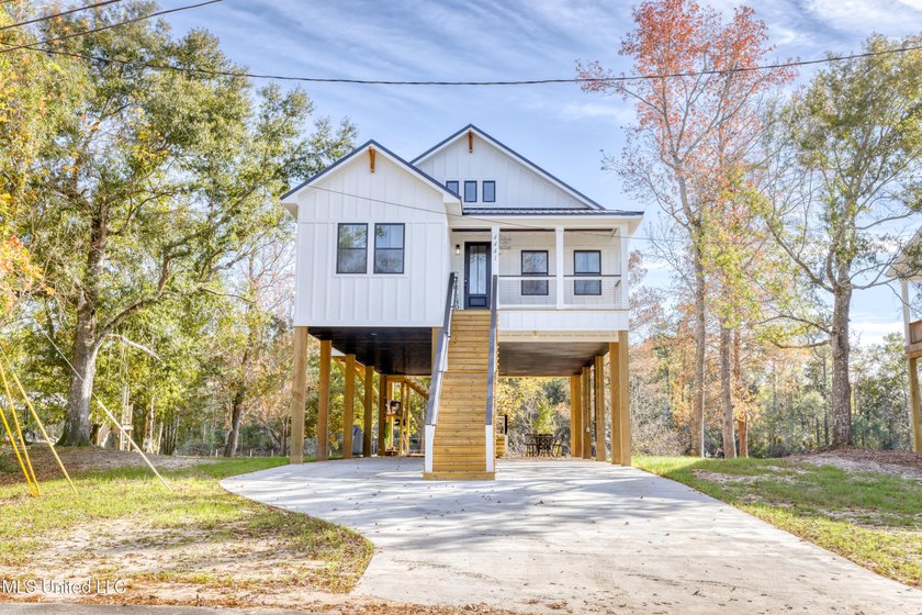 Discover the Height of Refined Living at 4441 Audubon Trail in - Beach Home for sale in Biloxi, Mississippi on Beachhouse.com
