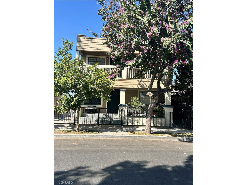 Own a stylish Craftsman-style fourplex rich in character and - Beach Townhome/Townhouse for sale in Long Beach, California on Beachhouse.com