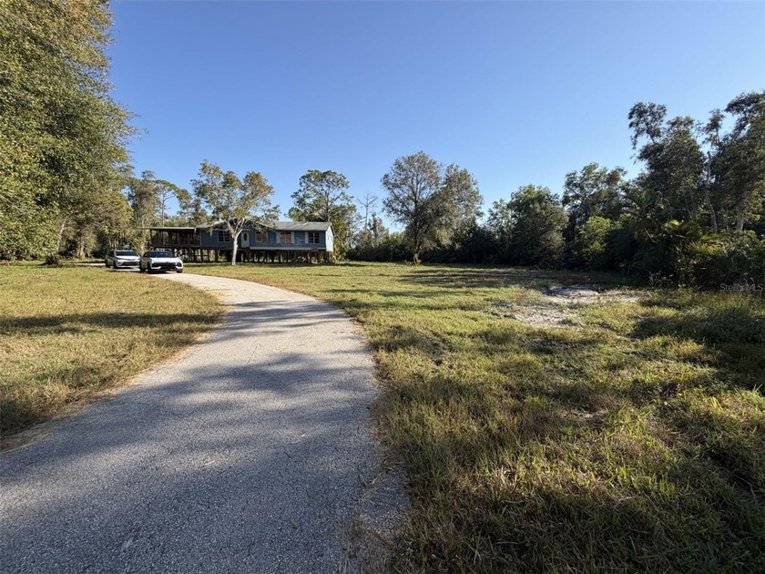 VALUE IS IN THE LAND. HOME IS DOWN TO THE STUDS. Rare 2-acre - Beach Home for sale in Fort Myers, Florida on Beachhouse.com