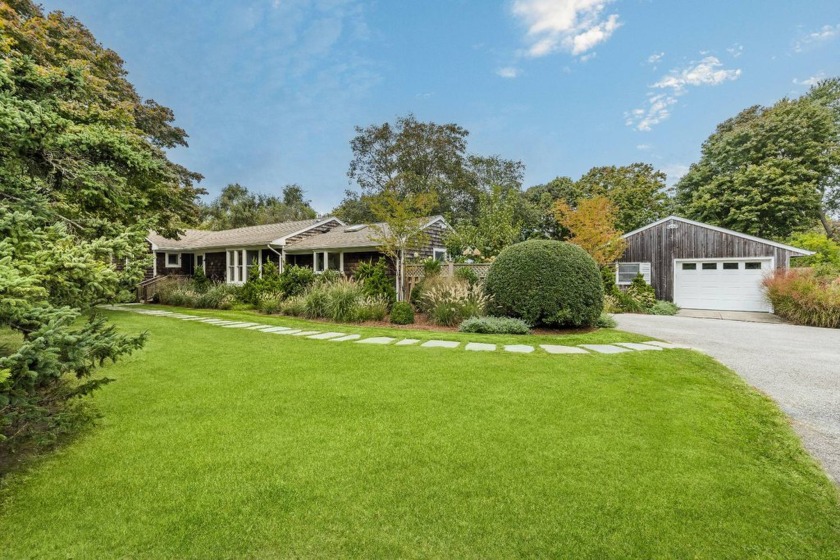 Discover the epitome of Hamptons living with this exquisite - Beach Home for sale in Sag Harbor, New York on Beachhouse.com