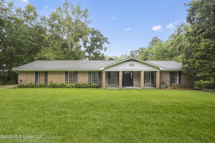 Enjoy waterfront living in this 3-bedroom, 2-bath home located - Beach Home for sale in Gautier, Mississippi on Beachhouse.com