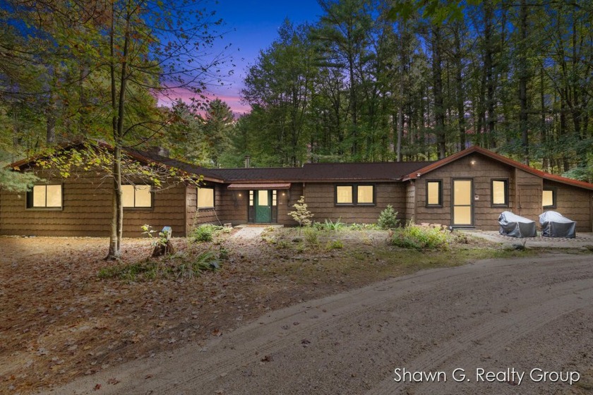 Escape to tranquility with this stunning cabin-style retreat - Beach Home for sale in Manistee, Michigan on Beachhouse.com