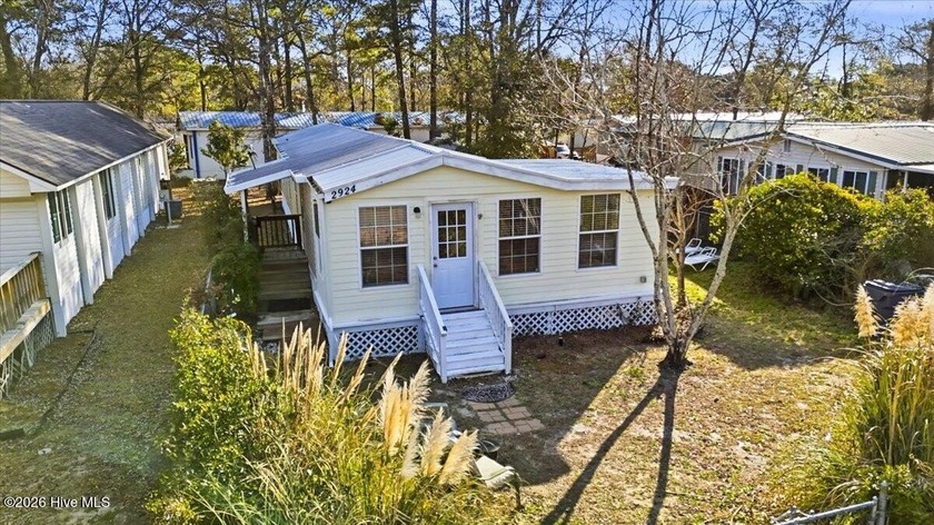 Imagine starting your day on the screened porch or sunroom - Beach Home for sale in Supply, North Carolina on Beachhouse.com