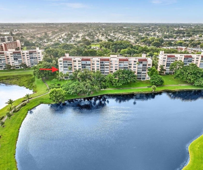 Enjoy serene lake views from this  4th-floor 2BR/2BA end-unit - Beach Condo for sale in Delray Beach, Florida on Beachhouse.com