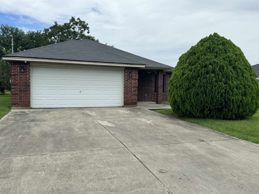 Welcome to this beautiful 3-bedroom, 2-bathroom brick home - Beach Home for sale in Port Arthur, Texas on Beachhouse.com