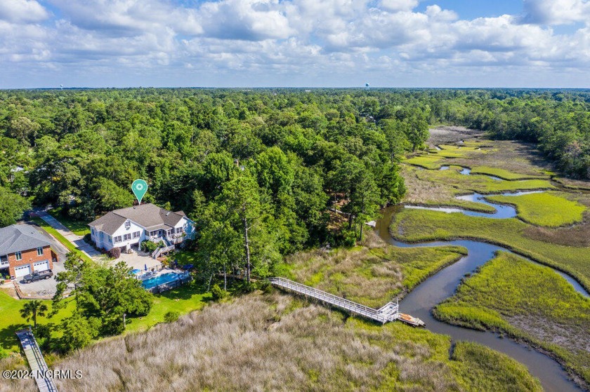 Experience luxury living with this stunning waterfront property - Beach Home for sale in Hampstead, North Carolina on Beachhouse.com