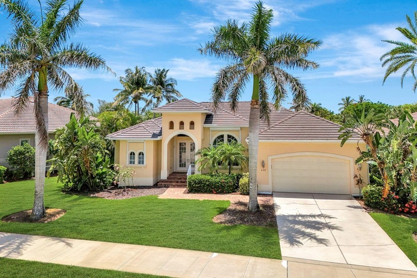 Just 1.5 blocks from the iconic Tigertail Beach, this - Beach Home for sale in Marco Island, Florida on Beachhouse.com