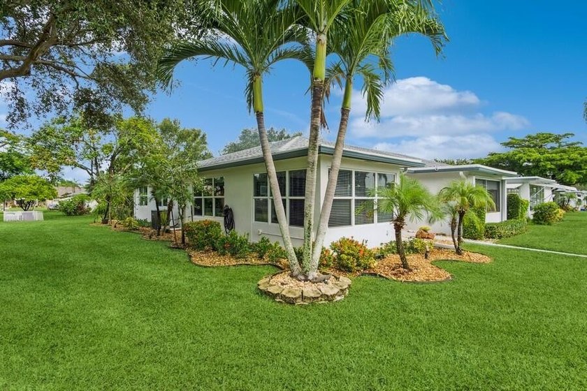 Oversized, secluded corner lot, sets the peaceful staging for - Beach Condo for sale in Delray Beach, Florida on Beachhouse.com