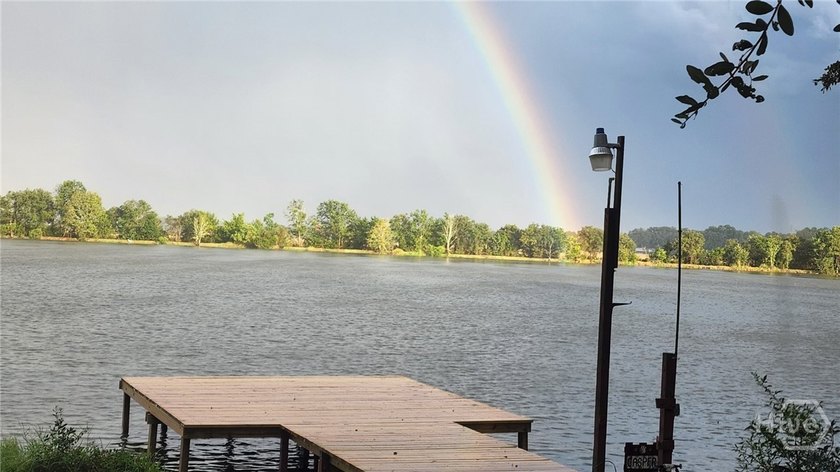 Welcome to this charming lakefront home on Lake George in Midway - Beach Home for sale in Midway, Georgia on Beachhouse.com