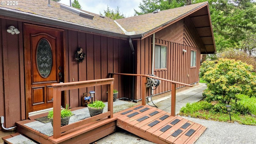 Discover coastal living in this single story 3 bedroom 2 full - Beach Home for sale in Gold Beach, Oregon on Beachhouse.com