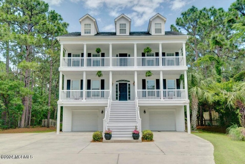 Nestled within the prestigious gated waterfront community of - Beach Home for sale in Wilmington, North Carolina on Beachhouse.com