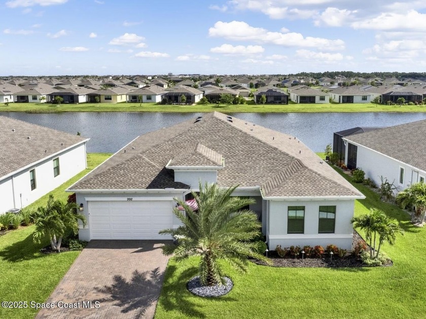 Stunning waterfront home in Bridgewater at Viera - a vibrant 55+ - Beach Home for sale in Melbourne, Florida on Beachhouse.com